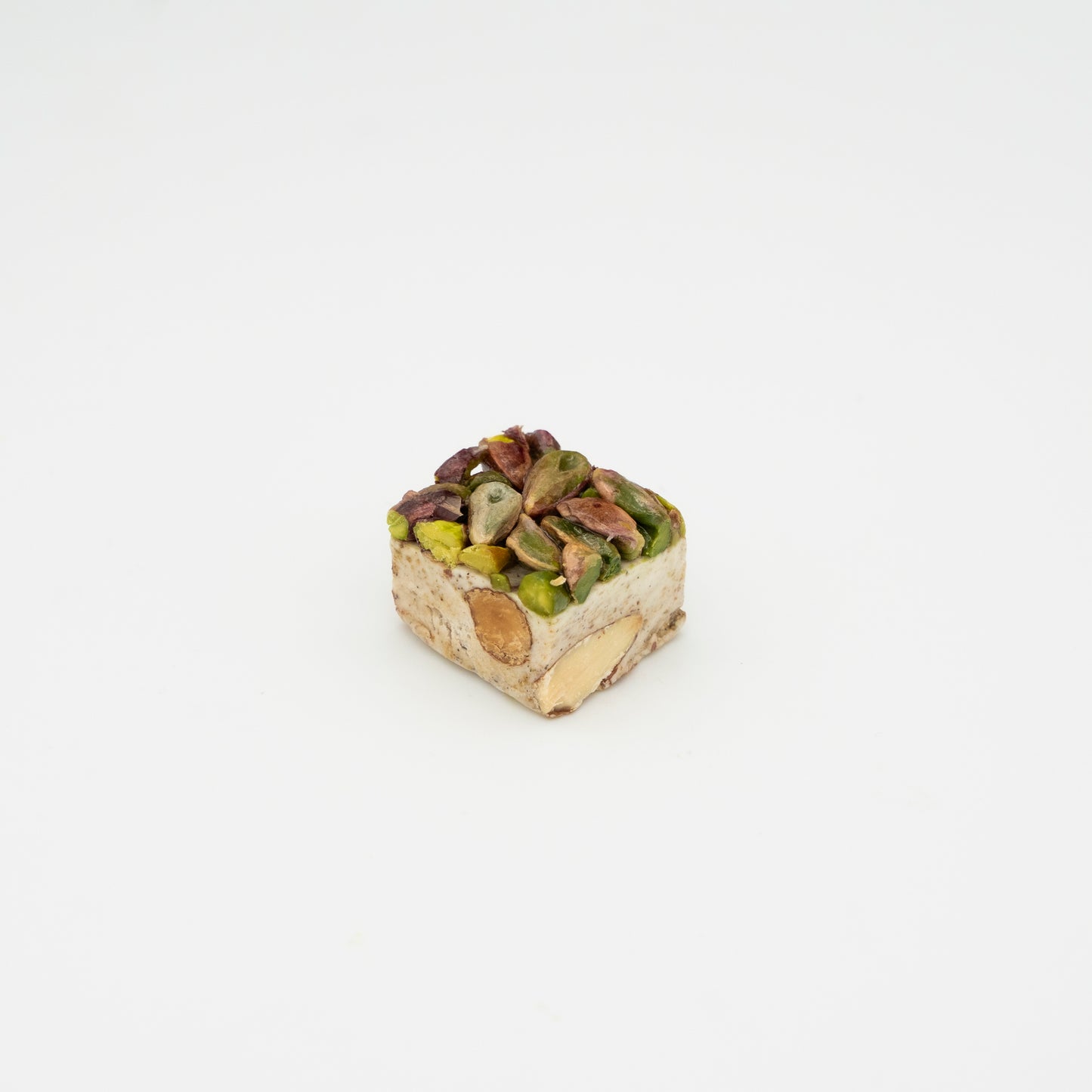 Pistachio whole crust filled with sliced almond 