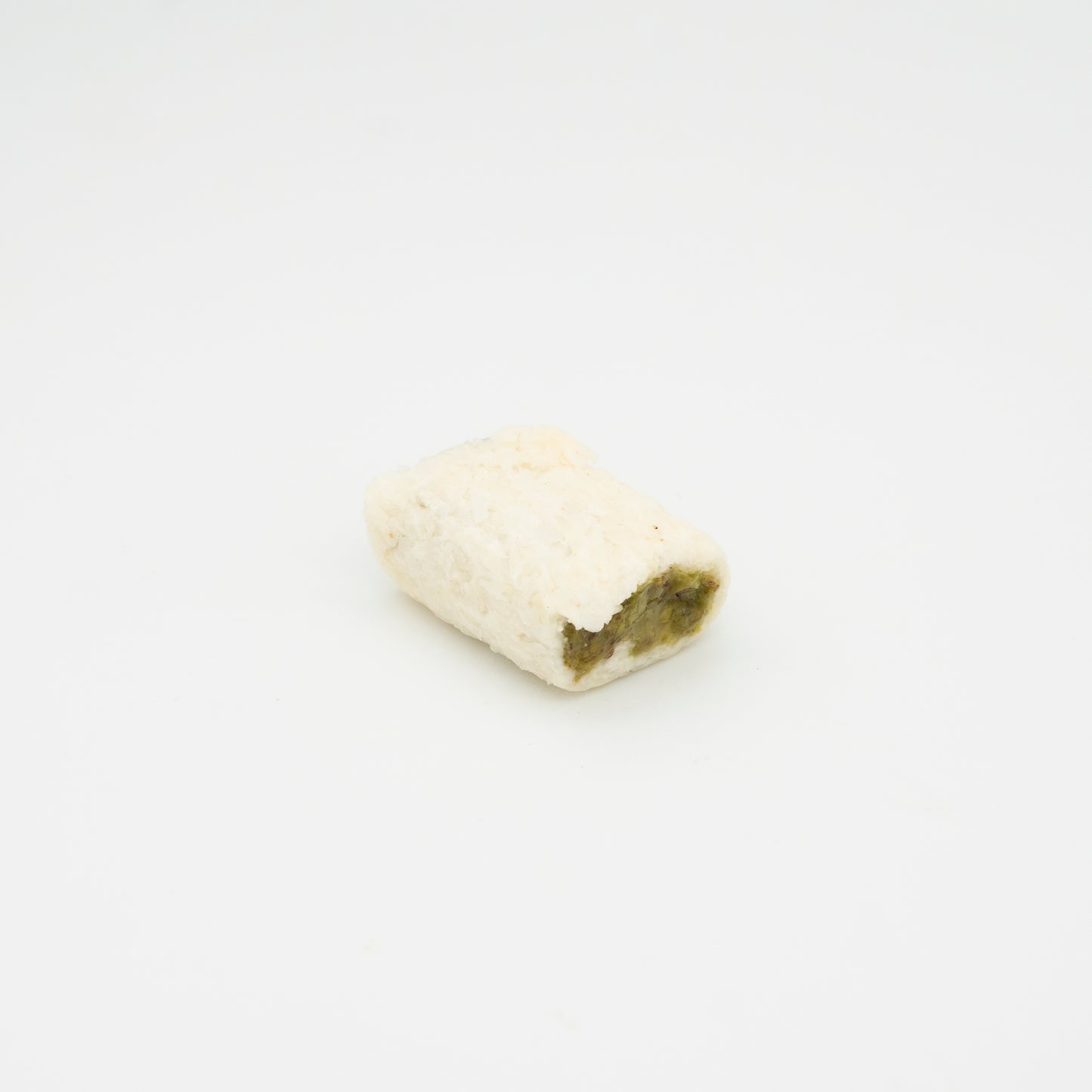 Powder wrapped with pistachio paste filling 