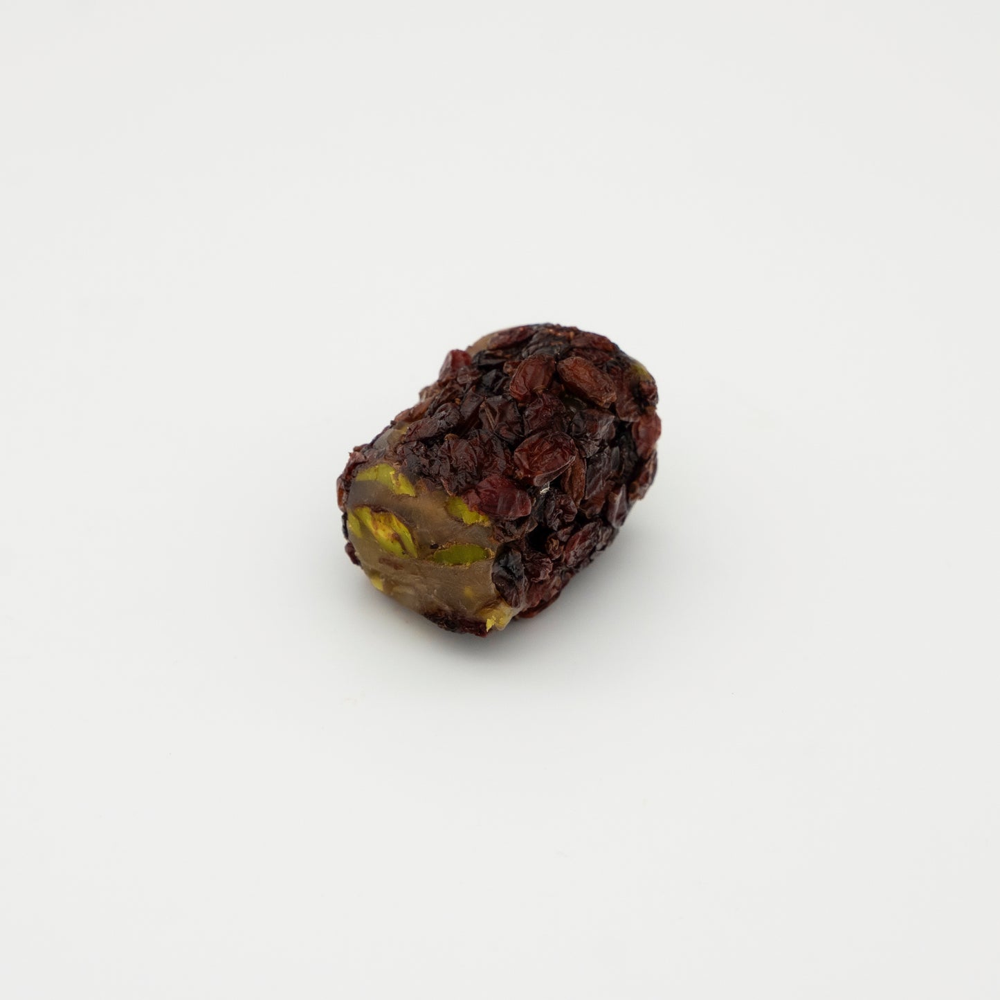 Traditional raisin wrapped with honey paste and pistachio filling