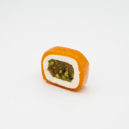 Dried orange crust filled with date paste and pistachio ￼